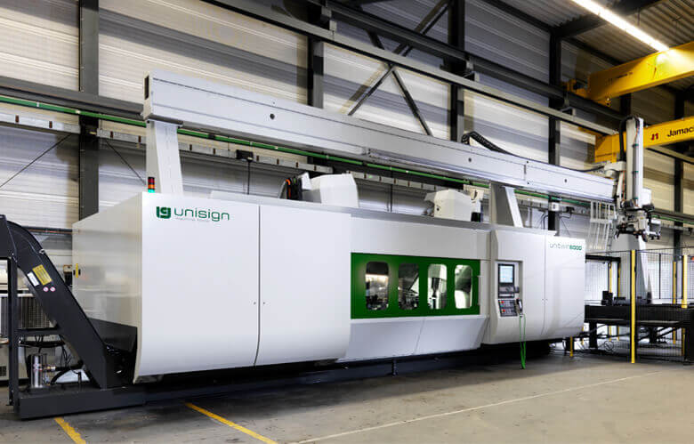 UNITWIN CNC machining centre | Front axle machining UNITWIN CNC machining centre | State of the art CNC machine | Front axles machining | High output | unisign.com